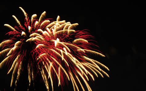 Download Wallpaper 2560x1600 Fireworks Sparks Explosions Light Red
