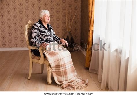 Alone Old Woman Sitting Chair By Stock Photo Edit Now 507815689
