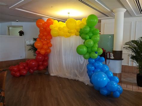 Rainbow Organic Backdrop With White Curtains Jocelyn Balloons