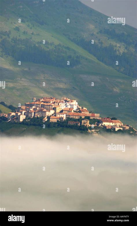 The Atmospheric Ancient Village Of Castelluccio Swathed In Clouds