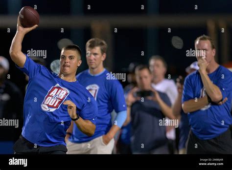 Purdue Quarterback Aidan Oconnell Left Throws Next To Former Nfl Quarterbacks Eli And Peyton