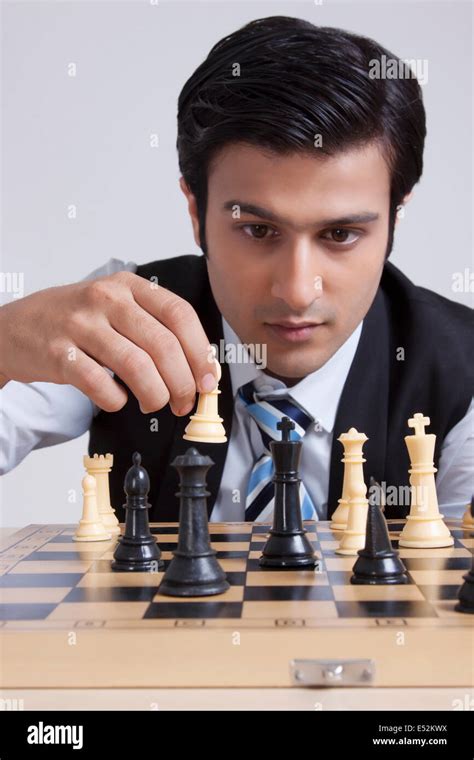 Businessman Playing Chess Stock Photo Alamy