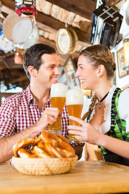 Premium Photo Couple Drinking Wheat Beer In Bavarian Restaurant
