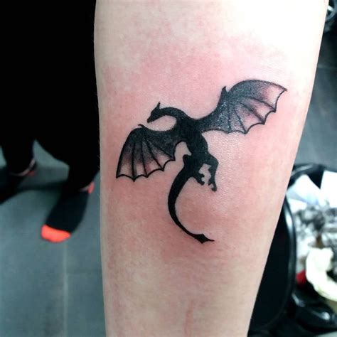 25 Dragon Tattoos That Are Equal Parts Pretty And Fierce Cute Dragon