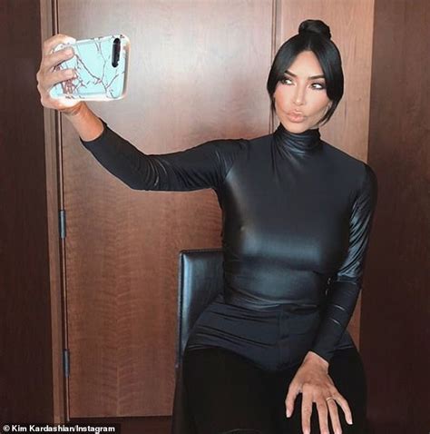 Kim Kardashian Showcases Her Hourglass Curves In Skintight Black Bodysuit With Leggings Daily