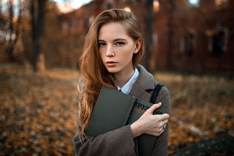 wallpaper model redhead long hair looking at viewer portrait freckles coats books