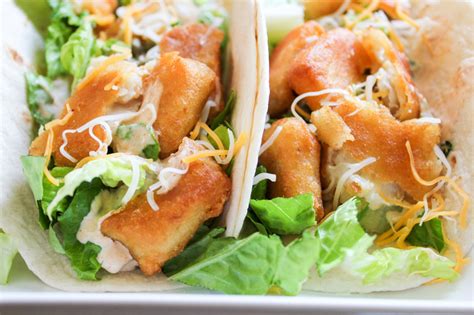 Quick and easy fish tacos make the perfect weeknight meal! Fish Tacos with Baja Cream Sauce | Daily Dish Recipes