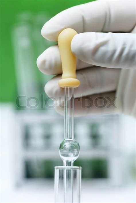 Dropper Holding By Hand In Laboratory Stock Image Colourbox