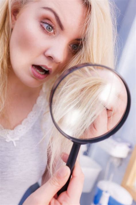 Woman Looking At Hair Ends Through Magnifying Glass Stock Image Image