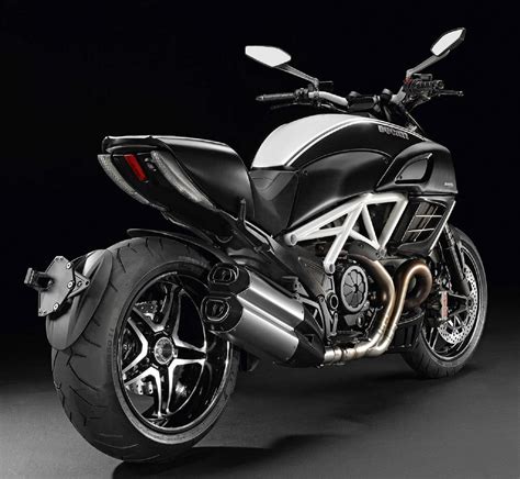 The bike also gets a tft display on its fuel tank which informs about the riding mode, gear selection, dtc. 2012 Ducati Diavel AMG Gallery 439424 | Top Speed