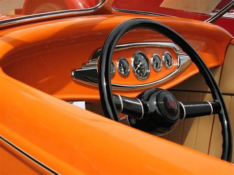 This stock photo is 3725px by 2722px. Orange Car Interior | Interior and steering wheel of a ...