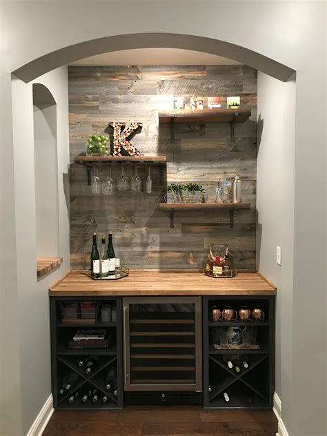 Easy to follow tutorial, and you need to go check out what she utilized to make a towel rack on this bar. Everything About New Mancave Remodel Do It Yourself #garagemancave #mancavebarberspa | Home bar ...