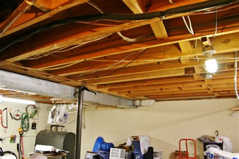 Most of the basement ceiling ideas here make. How to Insulate Your Basement - Rhapsody in Rooms