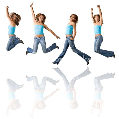 A Young Hispanic Girl In Her Early Twenties Jumping In The Air In Four