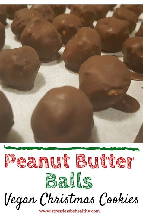 Vegan Christmas Cookies With Peanut Butter Balls In The Middle And Text