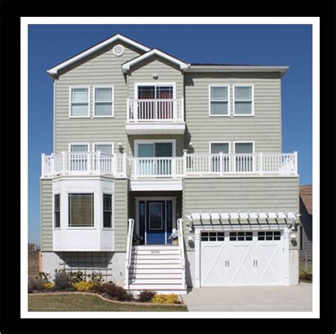 Outside entertainment is a priority on this house inc. 3 Story Beach House Plans with Elevator | plougonver.com