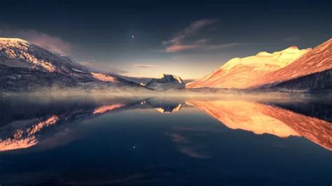 Reflection Of Snowy Mountains And Snowy Peaks In Clear Lake Water 2k