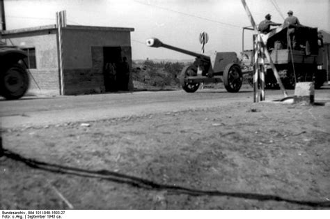 Photo German 75 Cm Pak 40 Anti Tank Gun Being Towed By A Tracked