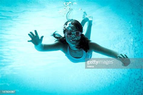 Teen Girl Swimming Underwater Photos And Premium High Res Pictures Getty Images