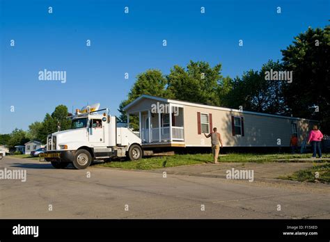 New mobile home being moved into place in trailer park Stock Photo - Alamy