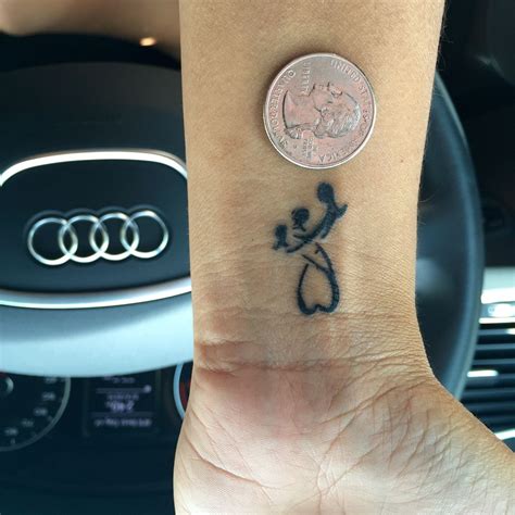 Mother two daughter tattoo | Tattoos for daughters, Tattoos for kids