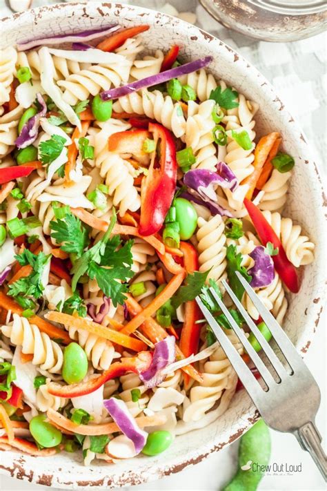 Top salad with chicken, cilantro (if using) and desired amount of dressing. Asian Pasta Salad with Sesame Ginger Dressing | Recipe ...