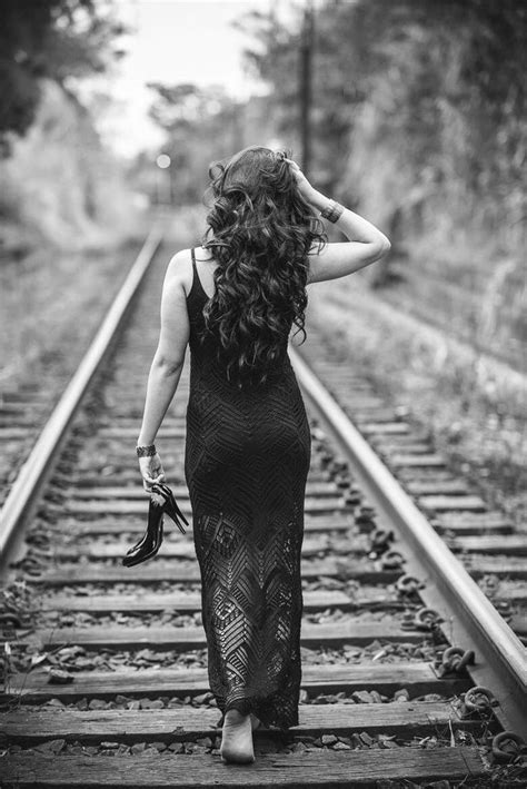 Woman Barefoot On Train Tracks Black And White Photography Train Tracks Photography Railroad