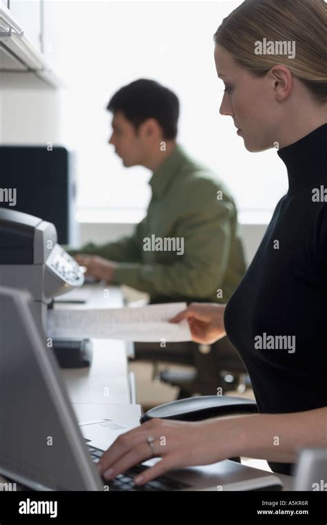 Businesspeople Working At Desks Stock Photo Alamy