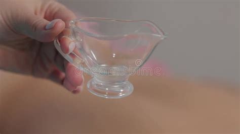 Woman Massage Therapist Pours Massage Oil On The Hand Stock Footage