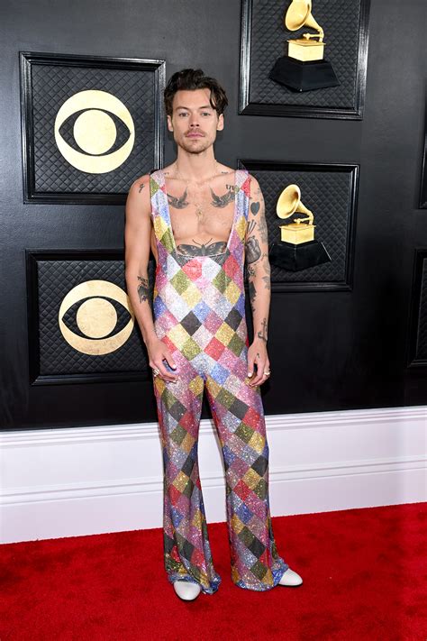 Harry Styles Sparkles In Jumpsuit At Grammy Awards Red Carpet