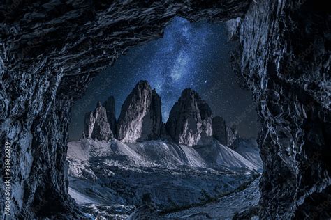Milky Way And Tre Cime Di Lavaredo From Cave Dolomites Stock Photo