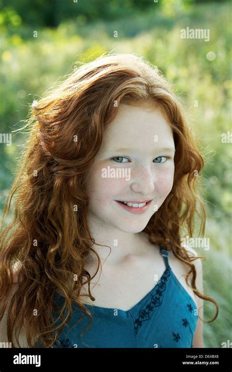 Beautiful 8 Year Old Red Headed Girl In Field Stock Photo Alamy