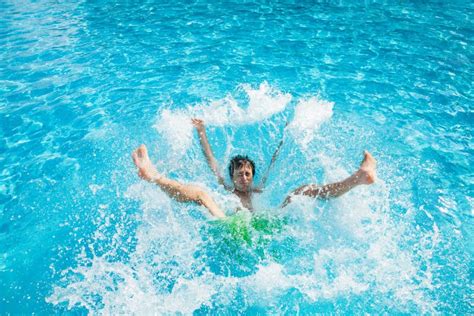 Man Falling And Splashing Into Water Stock Image Image Of Action