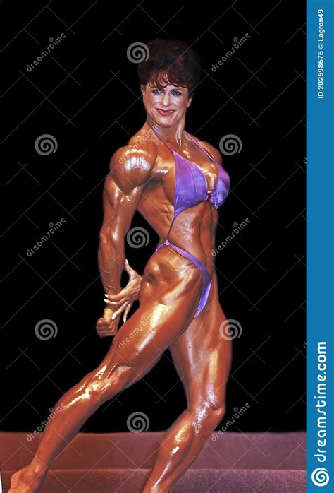 Pro Female Bodybuilder Diana Dennis Poses At 1993 IFBB Ms Olympia