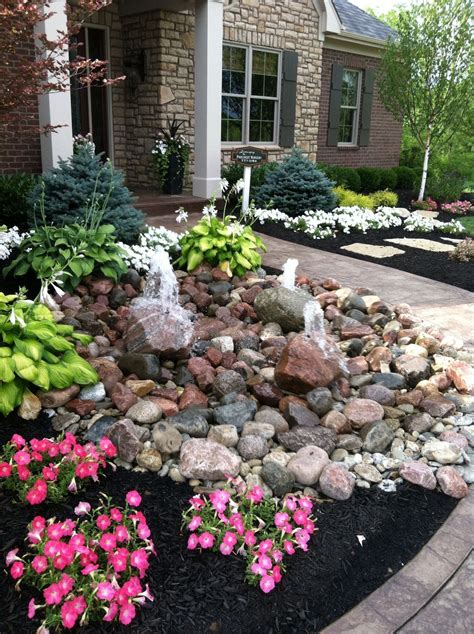 The potted plants will add color and interest at different levels. 43 Lovely River Rocks for Front Porch | Small front yard ...