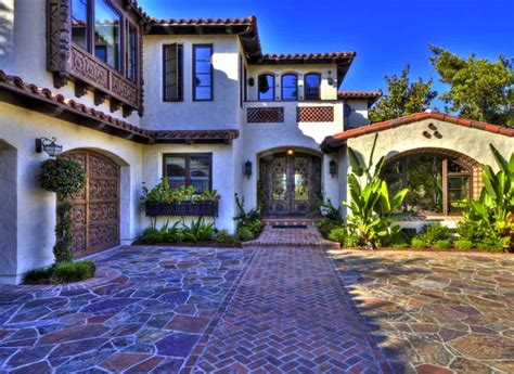 In addition, you'll find options in a number of shapes and sizes, so you'll have an easier time replacing a door of a specific fit. wood trim and garage detail | Mediterranean front doors ...