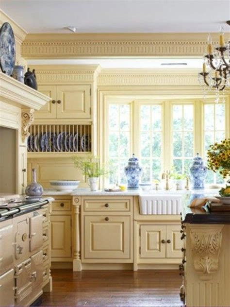 To add character to a neutral palette, consider going with a striking blue kitchen backsplash. lovely and warm yellow and blue kitchen. my all time ...
