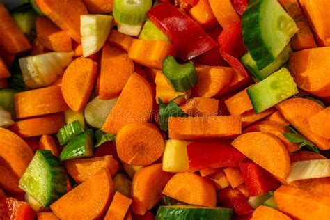 Different Varieties Of Vegetables Cut Into Small Pieces Stock Photo