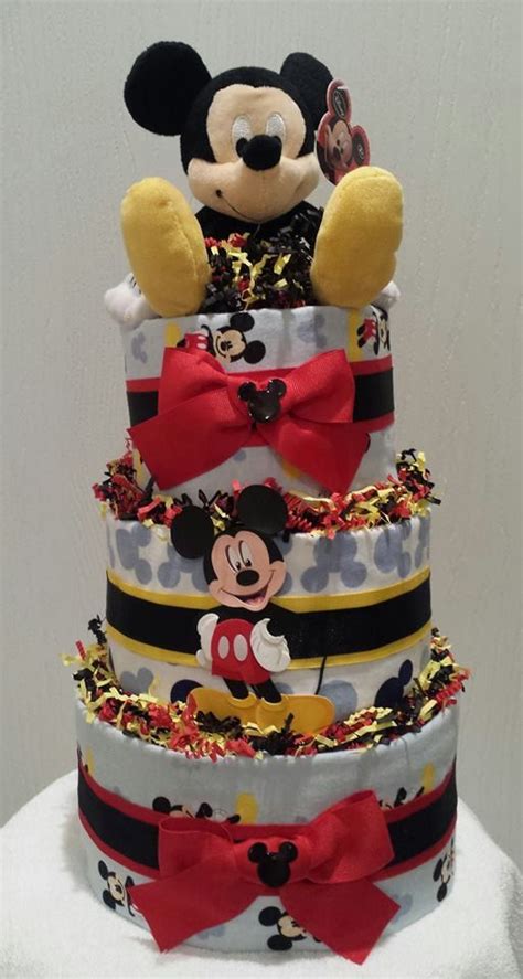 Make your baby shower a memorable one with best baby shower centerpieces. Mickey Mouse Diaper Cake by OccakesionsNBaskets on Etsy ...