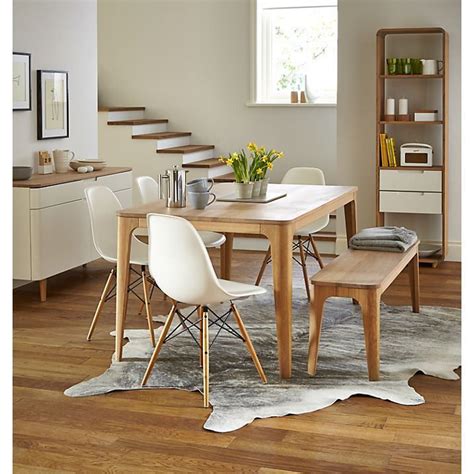A dining bench can be a fantastic way to maximize seating at a table. Charles Ray Eames Eiffel Inspired White DSW Dining Chair ...