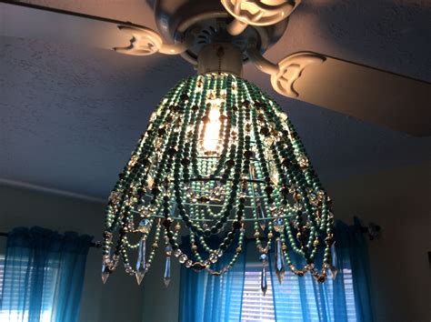 When shopping for one of these, note how large it is in comparison to the room you. Beaded chandelier attached to a ceiling fan | Beaded ...