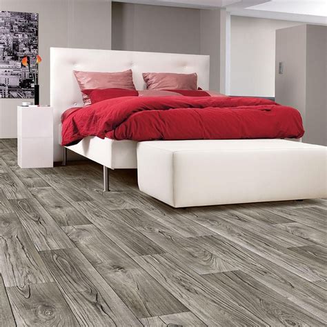 We decided to us a plank vinyl flooring product for the entry at a fixer project. TrafficMASTER Grey Weathered Oak Plank Residential Vinyl Sheet - 6 in. x 9 in. Take Home Sample ...