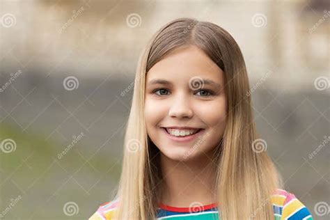 Portrait Of Happy Teen Girl Portrait Of Teen Girl With Blonde Hair