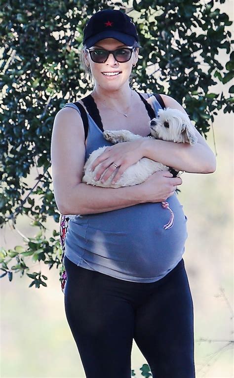 Pregnant Milla Jovovich Looks Ready To Pop With Her Pup E Online Ca