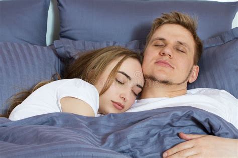 Young Cute Couple Sleeping Together In Bed Stock Image Image Of Happy Couple 146961395