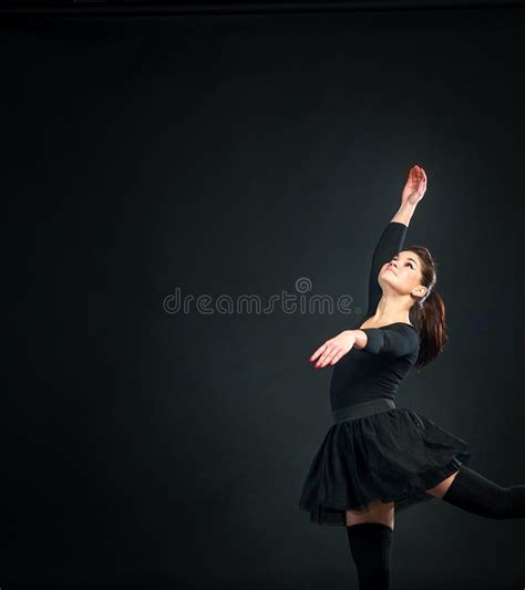 Beautiful Female Ballet Dancer On Black Background Stock Photo Image