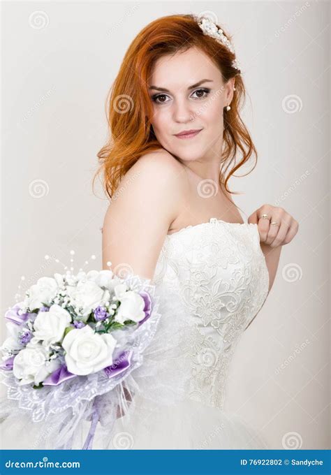 Red Haired Bride In A Wedding Dress Holding Wedding Bouquet Bright Unusual Appearance