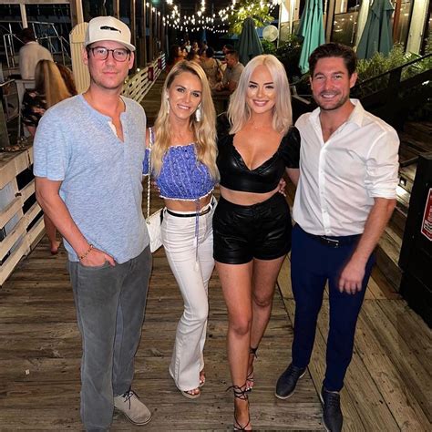 Southern Charm's Austen Kroll holds hands with Olivia Flowers