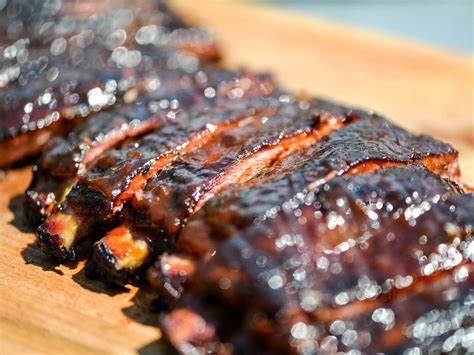 They're cooked low and slow on the grill for a tender meaty summer dinner and served. 12 Recipes for Smoky, Tender Ribs This July 4th | Serious Eats