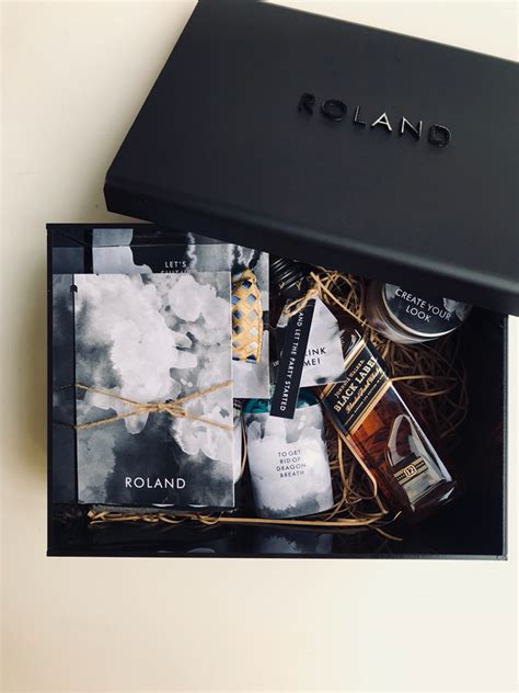Employee gift boxes & corporate care packages that support local. Black doff box by Gift box | Bridestory.com